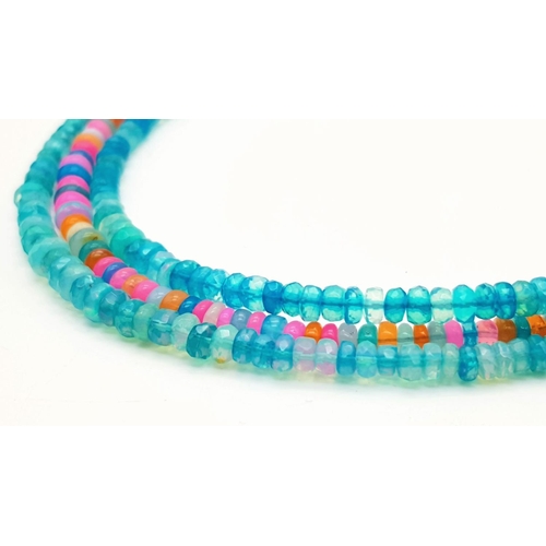 154 - A three-row necklace consisting of faceted opal beads predominantly with blue hues. Length: 43-48 cm... 