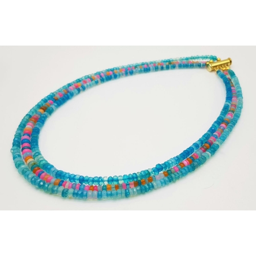 154 - A three-row necklace consisting of faceted opal beads predominantly with blue hues. Length: 43-48 cm... 