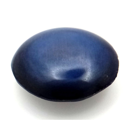 224 - A mesmerising, round/oval cabochon, six ray STAR SAPPHIRE, with a dark blue colouration. As sapphire... 