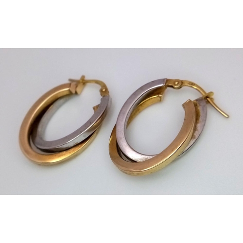 30 - A Pair of 9K Yellow and White Gold Oval Overlay Earrings. 1.9g