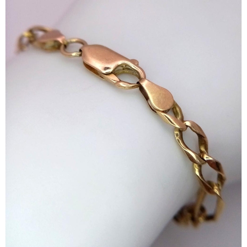 32 - A Vintage 9K Yellow Gold Figaro Link Bracelet. 18cm. 6.9g