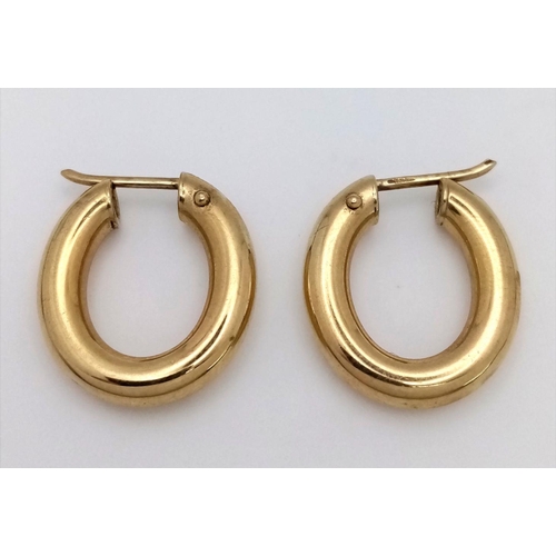 36 - A Pair of 9K Yellow Gold Oval Hoop Earrings. 2.7g