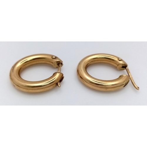 36 - A Pair of 9K Yellow Gold Oval Hoop Earrings. 2.7g