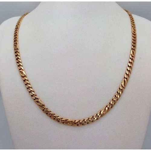 4 - A 14K Yellow Gold Flat Curb Link Chain. 46cm length. 26.7g