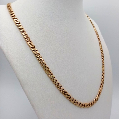 4 - A 14K Yellow Gold Flat Curb Link Chain. 46cm length. 26.7g