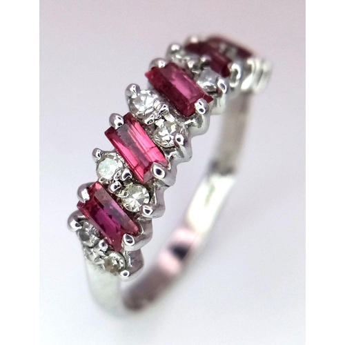 102 - AN 18K WHITE GOLD ( TESTED ) DIAMOND & RUBY BAND RING - 3.9G. SIZE Q. REF: 8555