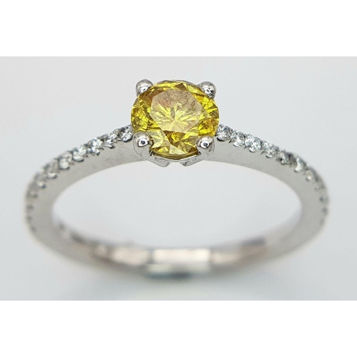 12 - AN 18K WHITE GOLD AND YELLOW DIAMOND 0.42CT RING - WITH DIAMOND SET SHOULDERS. 2.2G. SIZE I. REF: JL... 