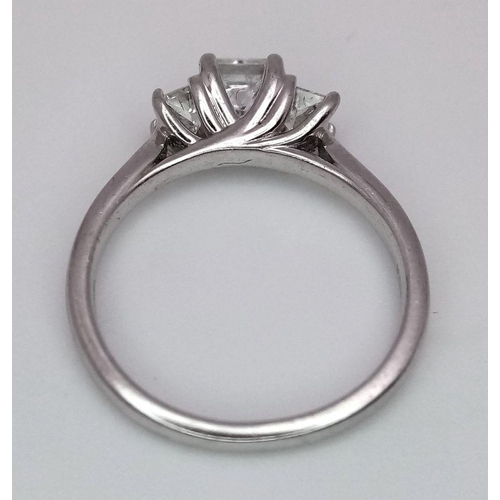 214 - AN 18K WHITE GOLD DIMAOND 3 STONE RING - 0.70CTW. 3.2G. SIZE K. REF: BL6011