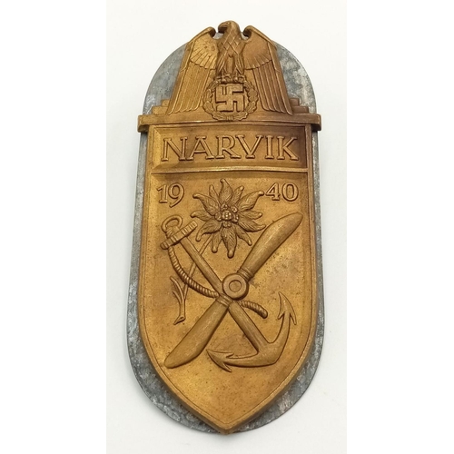 27 - WW2 German Kriegsmarine Narvik Shield. Missing it’s blue cloth and one clasp.