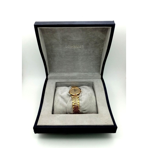 309 - A Gold Plated Longine La Grande Classique Quartz Ladies Watch. Gold plated bracelet and case - 24mm.... 