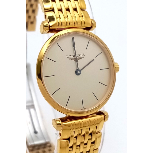 309 - A Gold Plated Longine La Grande Classique Quartz Ladies Watch. Gold plated bracelet and case - 24mm.... 