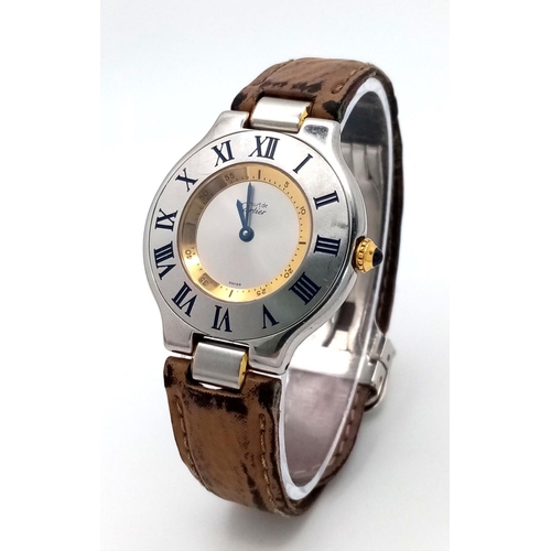 316 - A Vintage Must de Cartier 21 Quartz Unisex Watch. Leather strap with Cartier clasp. Cartier case -31... 