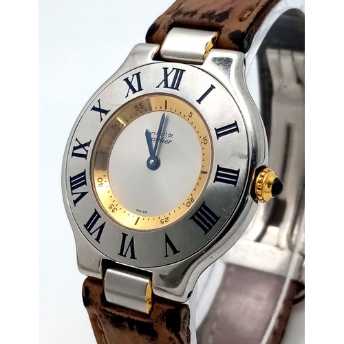 316 - A Vintage Must de Cartier 21 Quartz Unisex Watch. Leather strap with Cartier clasp. Cartier case -31... 