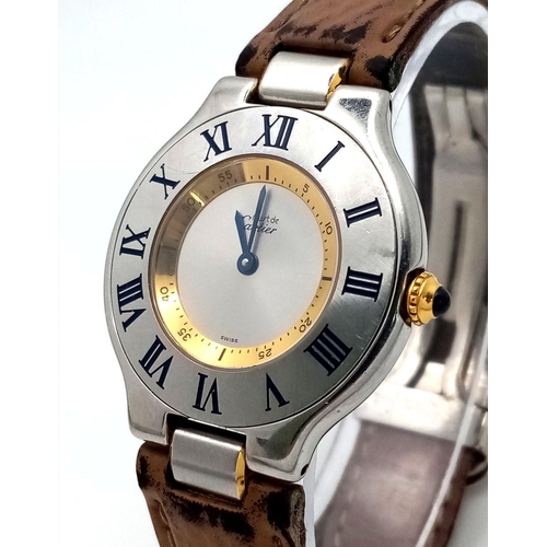 316 - A Vintage Must de Cartier 21 Quartz Unisex Watch. Leather strap with Cartier clasp. Cartier case -31... 