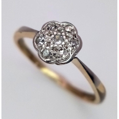 325 - AN 18K YELLOW GOLD & PLATINUM VINTAGE DIAMOND CLUSTER RING - 3.1G. SIZE R. REF: BLUND4015