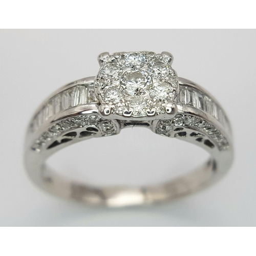 341 - AN 18K WHITE GOLD DIAMOND RING - 0.64CTW.  3.9G. SIZE N. REF: 7668