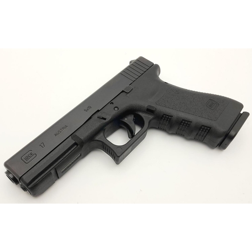 372 - A 9mm Glock Model 17 Generation 3 Semi-Automatic Pistol. As new with spare mag, loader, instructions... 