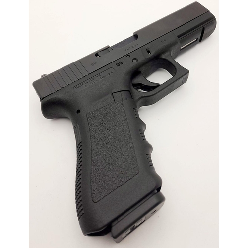 372 - A 9mm Glock Model 17 Generation 3 Semi-Automatic Pistol. As new with spare mag, loader, instructions... 