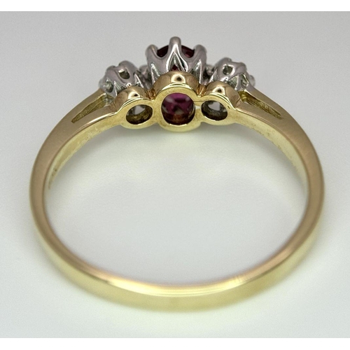 397 - A 9K YELLOW GOLD DIAMOND & RUBY 3 STONE RING -1.8G, SIZE L 1/2. REF: SC4069