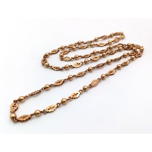 40 - An Antique 15K Yellow Gold (tested) Necklace with Bauble and Cross Shield Links. 64cm. 15.35g