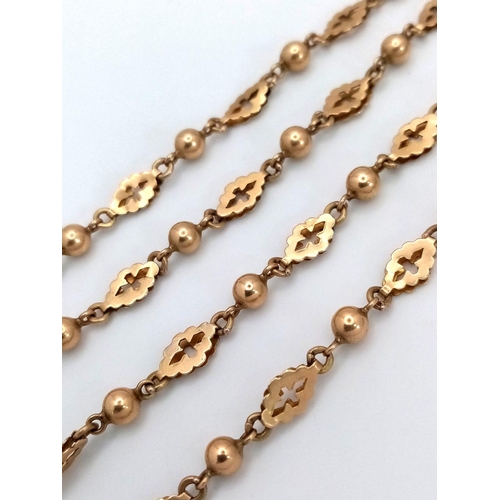 40 - An Antique 15K Yellow Gold (tested) Necklace with Bauble and Cross Shield Links. 64cm. 15.35g