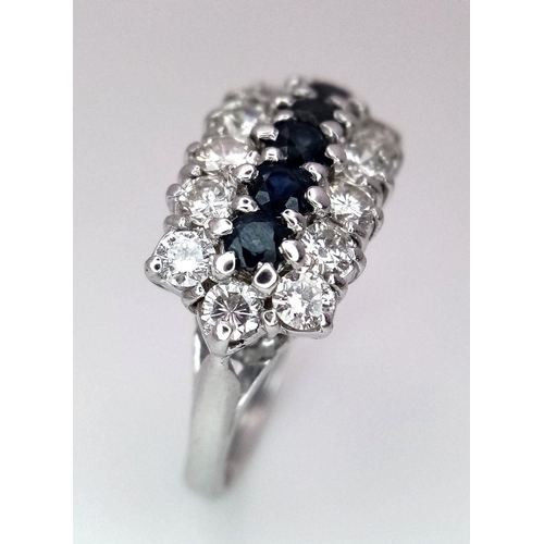 87 - AN 18K WHITE GOLD ( TESTED ) DIAMOND & SAPPHIRE CLUSTER RING - 0.84CT. 5G. SIZE J. REF: PERS4001