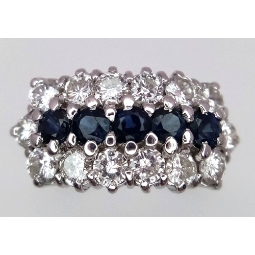 87 - AN 18K WHITE GOLD ( TESTED ) DIAMOND & SAPPHIRE CLUSTER RING - 0.84CT. 5G. SIZE J. REF: PERS4001