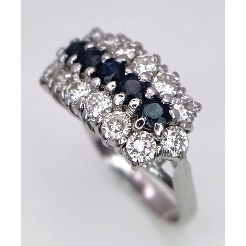 87 - AN 18K WHITE GOLD ( TESTED ) DIAMOND & SAPPHIRE CLUSTER RING - 0.84CT. 5G. SIZE J. REF: PERS4001