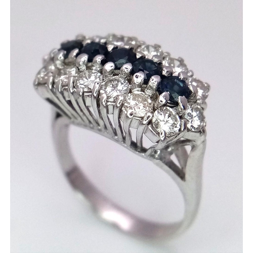 87 - AN 18K WHITE GOLD ( TESTED ) DIAMOND & SAPPHIRE CLUSTER RING - 0.84CT. 5G. SIZE J. REF: PERS4001