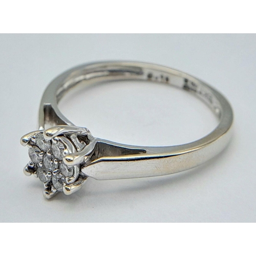 89 - AN 18K WHITE GOLD DIAMOND RING - 0.15CTW. 2.8G. SIZE N. REF: SC4044