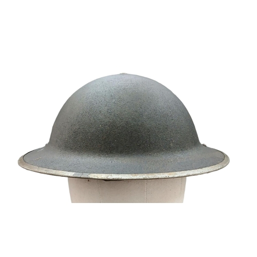 187 - WW2 British Mk II Helmet has the insignia of the Scots Guards. This helmet was found in Italy. They ... 