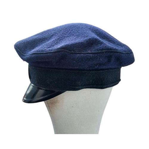 208 - WW2 Polish Ghetto Police Visor Cap and badge.