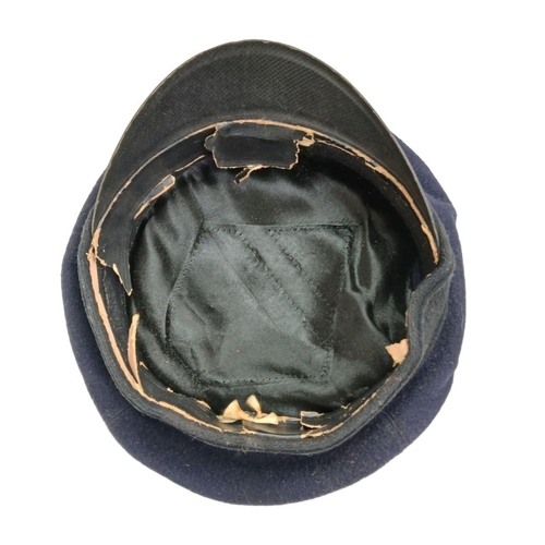 208 - WW2 Polish Ghetto Police Visor Cap and badge.