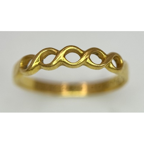 367 - A 22 Carat Gold Vintage Celtic Design Band Ring Size P. Gross Weight 2.37 Grams.