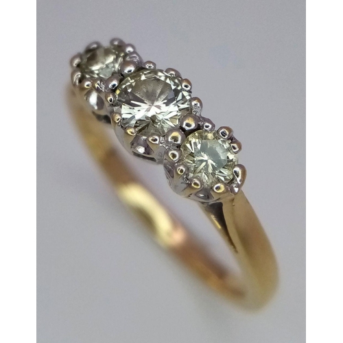 381 - A 2002 Hallmarked London 18 Carat Yellow Gold Diamond Set Trilogy Ring Size L. 0.50 Carats of Diamon... 