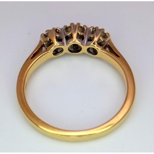 381 - A 2002 Hallmarked London 18 Carat Yellow Gold Diamond Set Trilogy Ring Size L. 0.50 Carats of Diamon... 