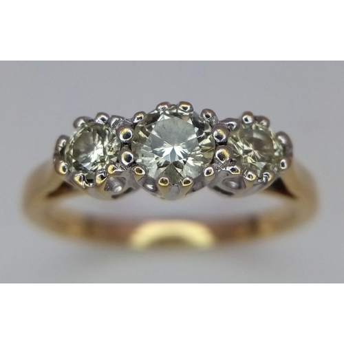 381 - A 2002 Hallmarked London 18 Carat Yellow Gold Diamond Set Trilogy Ring Size L. 0.50 Carats of Diamon... 