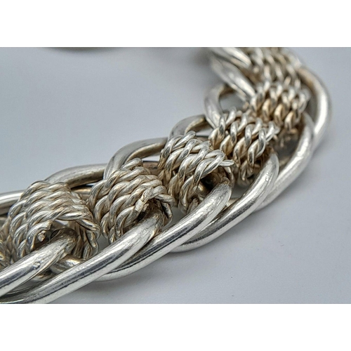 437 - A Very Stylish Sterling Silver Chain Link T-Bar Bracelet. 20cm Length. 36.54 Grams. Comes in a prese... 