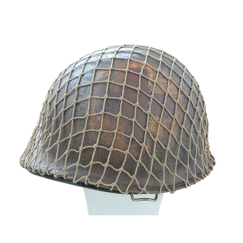 62 - WW2 US Medics Helmet. With a Westinghouse Liner. Both Helmet and liner bear the red cross insignia. ... 