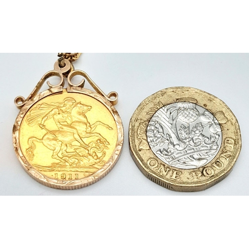 5 - A 22K GOLD FULL SOVEREIGN IN A 9K GOLD SETTING AND ON A 48cms 9K GOLD FIGARO LINK NECK CHAIN .  13.4... 