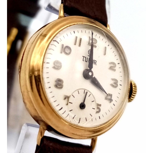 276 - A Vintage 9K Gold Cased Tudor Mechanical Ladies Watch. Brown leather strap. 9k gold case - 21mm. Whi... 