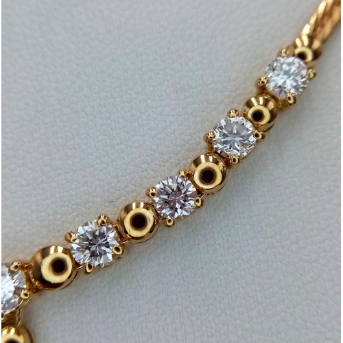 19 - A Gorgeous 18K Yellow Gold Diamond Necklace - Herringbone form leads to 10 brilliant round cut diamo... 