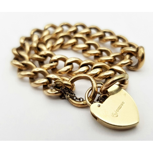 191 - A Vintage 9K Yellow Gold Curb Link Bracelet with Heart Clasp. Multiple hallmarks. 18cm. 24.6g