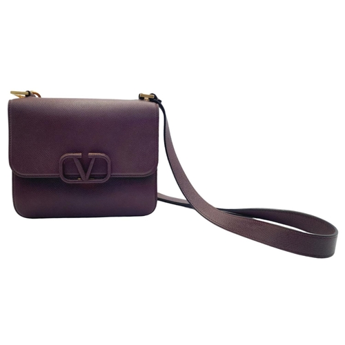 270 - A Valentino Burgundy VSLING Shoulder Bag. Leather exterior with gold-toned hardware, chain and leath... 