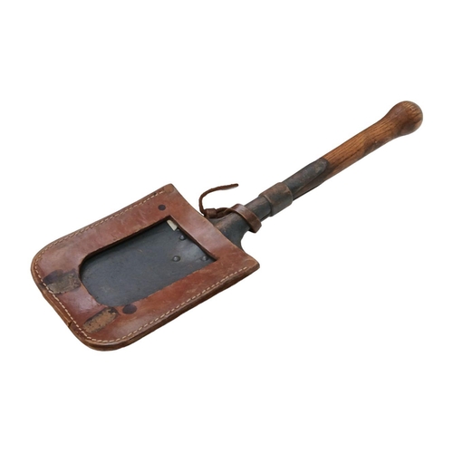 571 - A WW2 German Trench Spade in its original leather case. 56cm Length. Good Solid Condition. From a pr... 