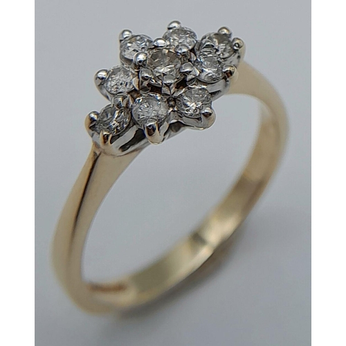 572 - A 9K YELLOW GOLD DIAMOND CLUSTER RING - 0.20CTW. 2.2G. SIZE K. REF: SC4053