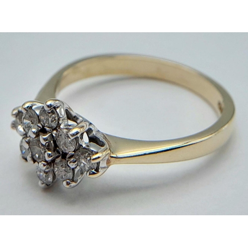 572 - A 9K YELLOW GOLD DIAMOND CLUSTER RING - 0.20CTW. 2.2G. SIZE K. REF: SC4053