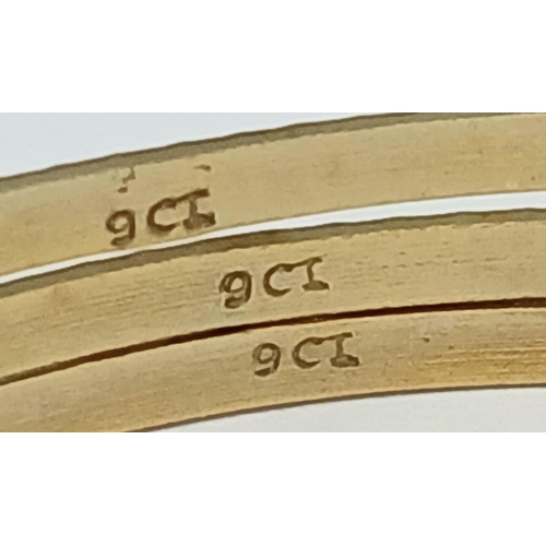 100 - A MATCHING SET OF 3 PATTERNED BANGLES IN 9K GOLD .   12.7gms