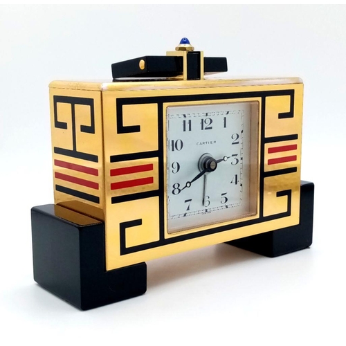 130 - A Must de Cartier Bedside Alarm Clock. Gilded and enamel decoration. Quartz movement. In need of a b... 