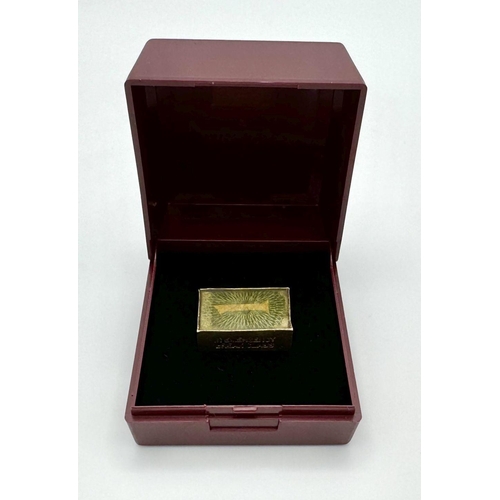 132 - Vintage 9 carat GOLD CHARM. Consisting folded £1 Note in a GOLD CASE.Full UK Hallmark. 2.7 grams.